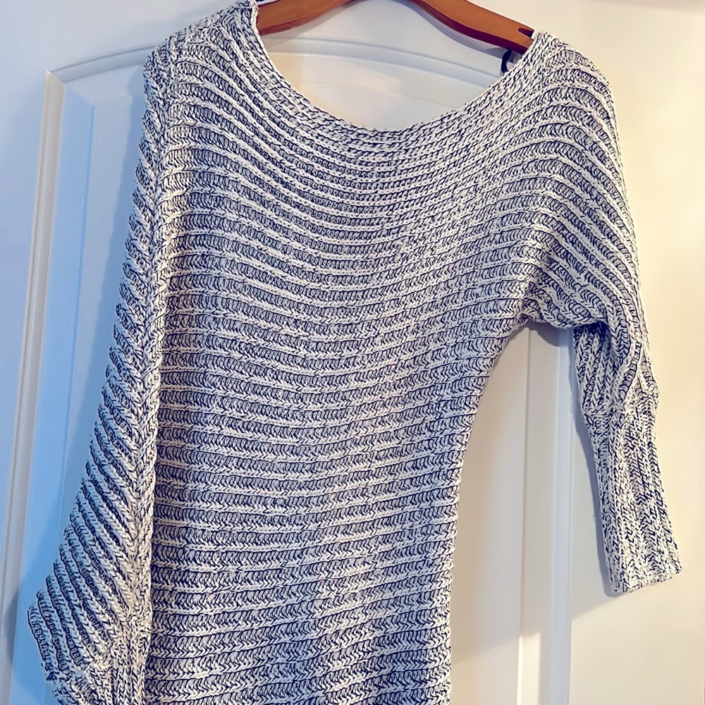 Black and white off shoulder  knitted sweater, size small.  in great condition.